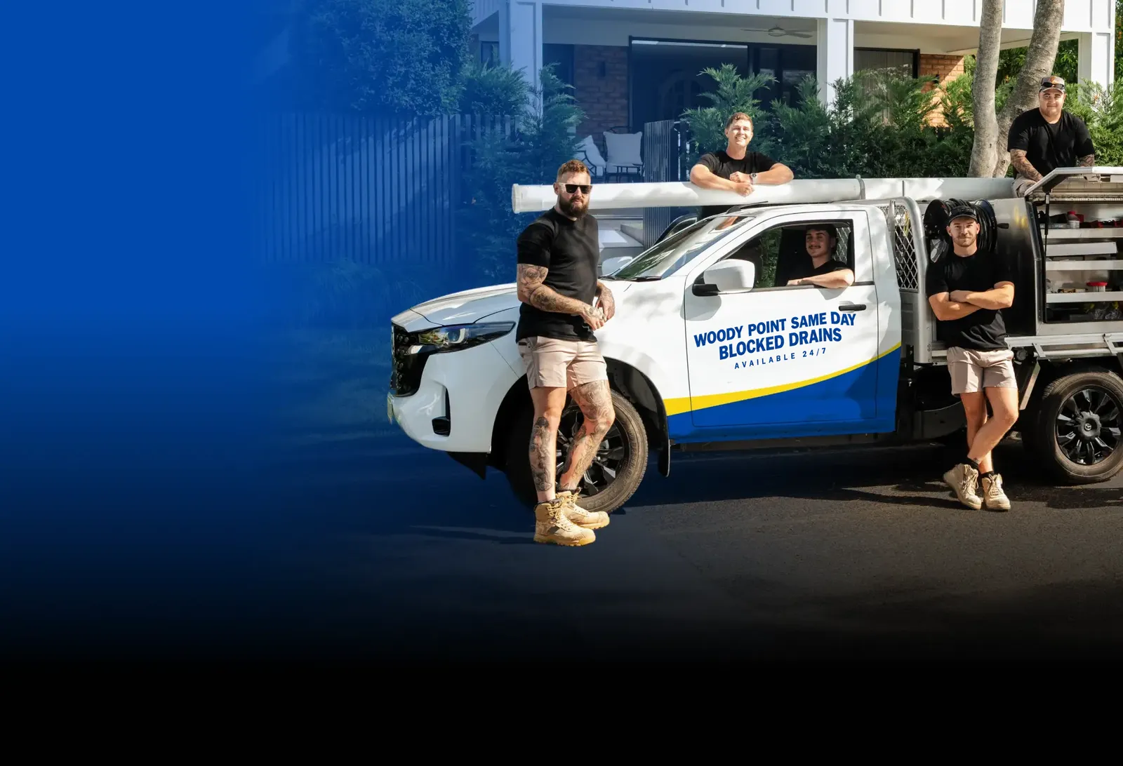 Woody Point Same Day Blocked Drains team with the ute